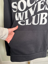 Load image into Gallery viewer, Large Anti social wives club unisex crewneck in black with front pockets!
