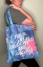 Load image into Gallery viewer, Tote bag; fueled by iced coffee and anxiety cotton candy blue and pink 15”x16”
