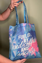 Load image into Gallery viewer, Tote bag; fueled by iced coffee and anxiety cotton candy blue and pink 15”x16”
